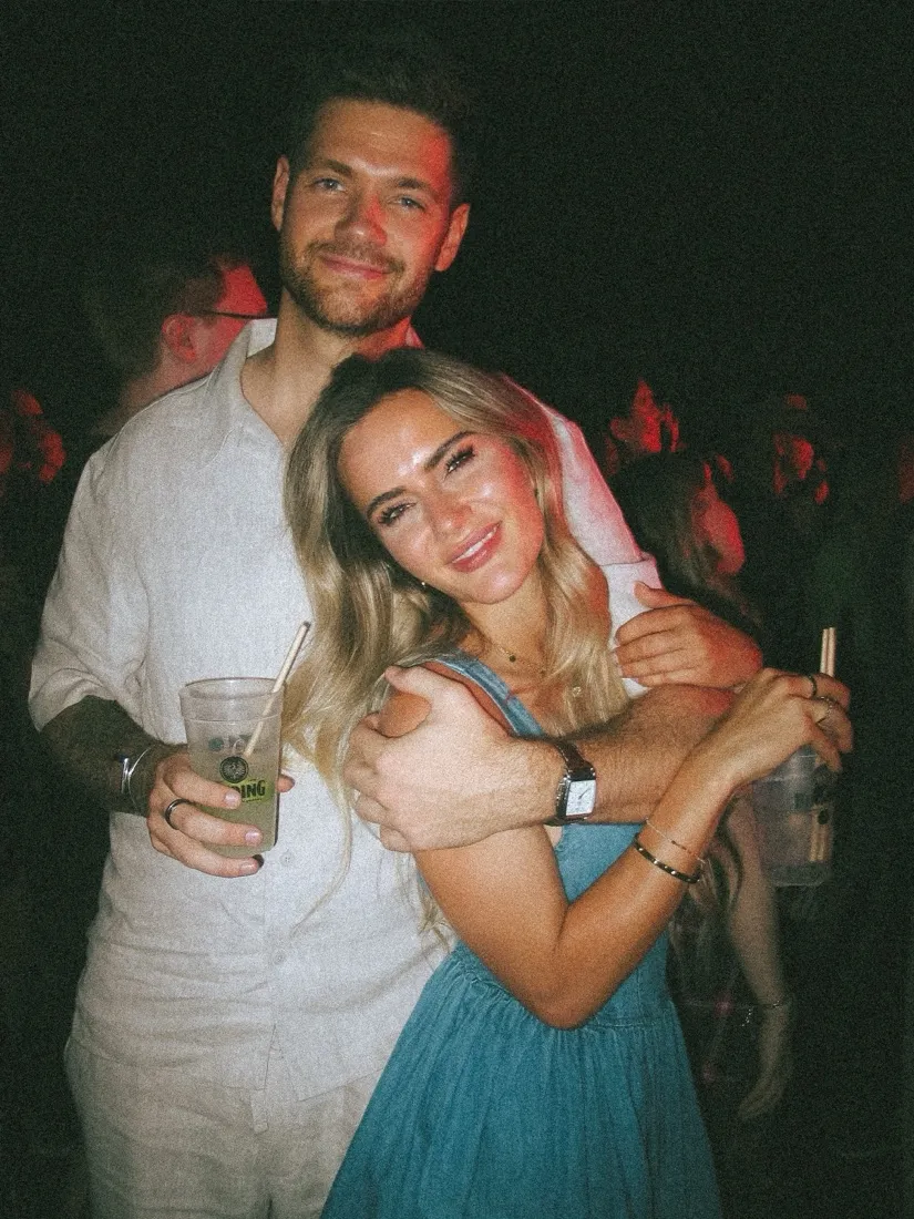 Julian with Stella at a party